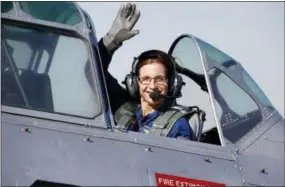  ?? MATT YORK — THE ASSOCIATED PRESS ?? Rep. Martha McSally, R-Ariz., leaves in a T-6 World War II airplane after speaking at a rally in Phoenix. Women with military experience — many of them combat veterans — are among the record number of female candidates running for office this year.
