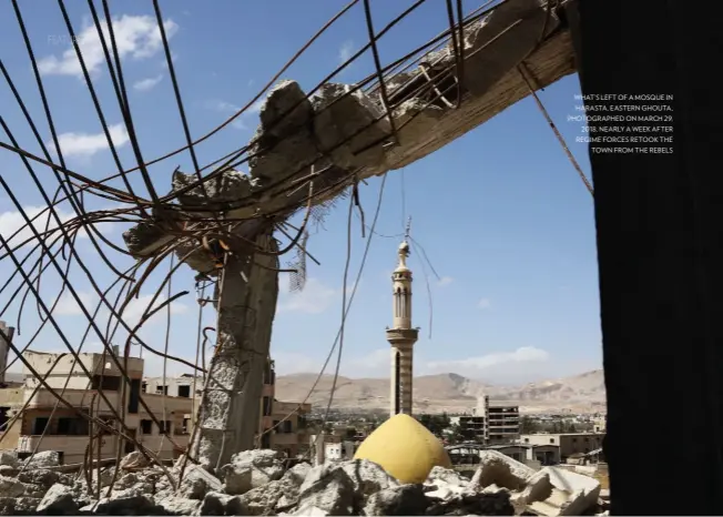  ??  ?? what’s left of a mosque in harasta, eastern Ghouta, photograph­ed on march 29, 2018, nearly a week after regime forces retook the town from the rebels