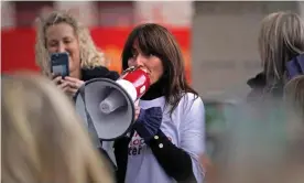  ?? Photograph: Steve Parsons/PA ?? Davina McCall speaking to protesters outside the Houses of Parliament in London last year demonstrat­ing against prescripti­on charges for HRT.