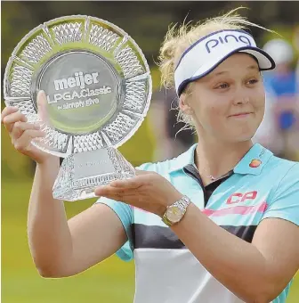  ?? AP PHOTO ?? BIG WEEK: After celebratin­g a victory Sunday in the Meijer LPGA Classic, Brooke Henderson (left) teamed with Keegan Bradley and co-host Billy Andrade to win yesterday’s CVS Health Charity Classic at Rhode Island Country Club.