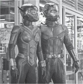  ?? MARVEL STUDIOS ?? Hope Van Dyne (Evangeline Lilly) gets her own suit – and kick-butt confidence – teaming with Scott Lang (Paul Rudd) in “Ant-Man and the Wasp.”