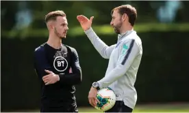  ?? Photograph: Eddie Keogh for The FA/Shuttersto­ck ?? James Maddison (left) speaks to Gareth Southgate during training with England in September.