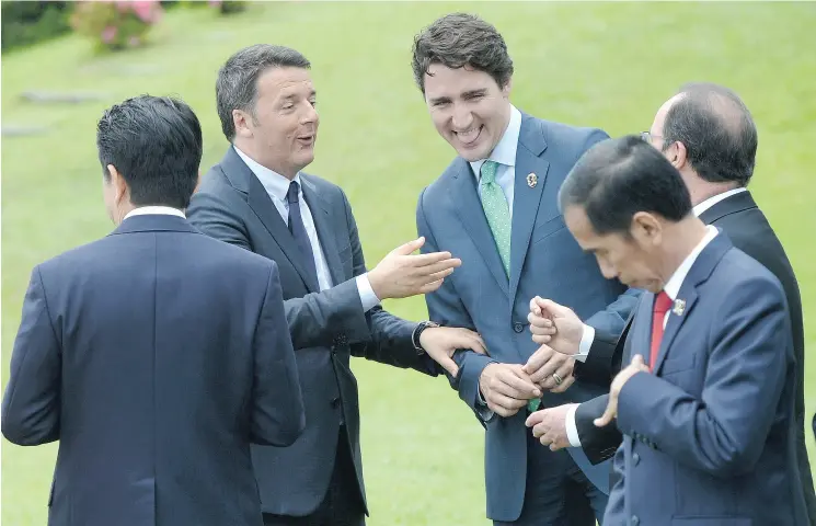  ?? SEAN KILPATRICK / THE CANADIAN PRESS ?? Prime Minister Justin Trudeau appears to focus on good relations with everyone. That will keep us out of trouble, but no one should imagine it will confer any influence on us.