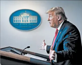  ?? DREW ANGERER/GETTY ?? President Donald Trump speaks Thursday during a White House briefing on the coronaviru­s pandemic.