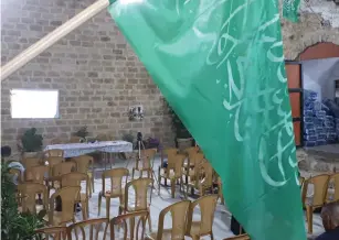  ?? (Rami Khaldoun) ?? A GREEN FLAG hangs over the courtyard of the mosque in Jaffa where the meeting took place.