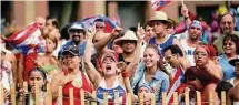  ?? Volpe file photo ?? Fans enjoy the Puerto Rican Festival in New Haven in 2022.