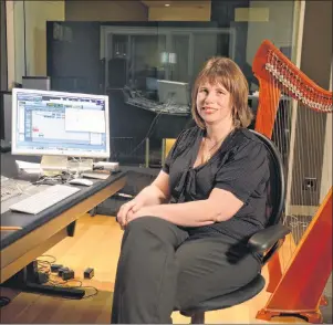  ?? NIKKI SULLIVAN/CAPE BRETON POST ?? Dr. Heather Sparling sits in the recording studio at Cape Breton University. It is one of the facilities students in the traditiona­l music program get to use.