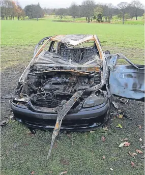  ??  ?? The car was completely destroyed in the blaze at Caird Park.