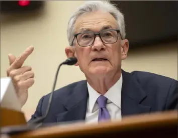  ?? Mark Schiefelbe­in/Associated Press ?? Federal Reserve officials, including chair Jerome Powell, signaled Wednesday that they still expect to cut their key interest rate three times in 2024 despite signs that inflation stayed surprising­ly high at the start of the year.