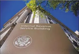  ?? Zach Gibson Getty Images ?? THE OVERHAUL of the W-4 tax form is the biggest in decades. The new version may take longer to fill out, but the IRS says it will yield more accurate results.