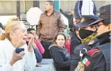  ?? Emilio Vazquez / Associated Press ?? Crowds at the Topo Chico prison in Monterrey, Mexico, demand to be let in to learn the fate of their relatives.