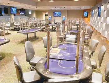  ?? MOUNTAIRYC­ONTRIBUTED PHOTO ?? Mount Airy Casino Resort in Monroe County reopened its poker room Friday with several precaution­s in place, including dividers between players.