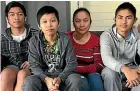  ??  ?? John, 16, Jovien, 22, Dovie, 47, and Jude Basinal, 15, have kept a daily vigil by Jun’s bedside.