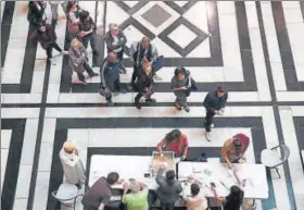  ?? AFP ?? (Above) People queue at a polling station in Marseille, southern France; (right) French nationals at a booth in Puducherry on Sunday.