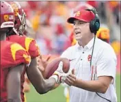  ?? Wally Skalij Los Angeles Times ?? CLAY HELTON’S USC teams have never lost a game in the Coliseum — a 16-game win streak.