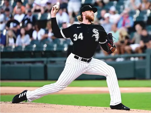  ?? QUINN HARRIS/GETTY IMAGES ?? Sox starter Michael Kopech pitches in the first inning of a six-inning outing Friday. He set off a confrontat­ion in the second when he plunked Jorge Mateo.