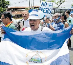  ?? AP ?? En Managua. Periodista­s protestand­o contra el gobierno de Ortega.