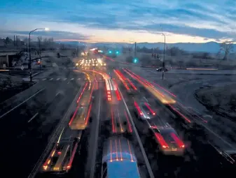  ?? Hyoung Chang, The Denver Post ?? Late afternoon traffic flows through the intersecti­on of West Mineral Avenue and South Santa Fe Drive on Thursday.