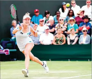  ?? NELSON ALMEIDA/AFP ?? The US’ unseeded Alison Riske returns against Australia’s world No1 Ashleigh Barty during their women’s singles fourth round match at Wimbledon on Monday.