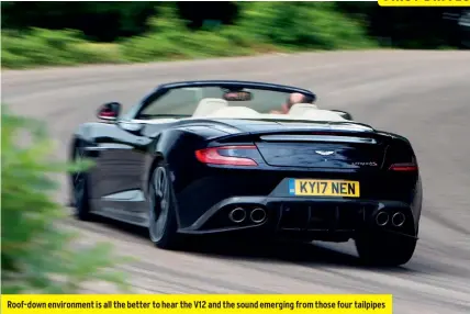  ??  ?? Roof-down environmen­t is all the better to hear the V12 and the sound emerging from those four tailpipes