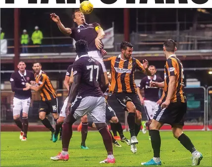  ??  ?? CAPTAIN CALLING: Christophe Berra outjumps the East Fife defence and his own team-mates to head Hearts’ second goal