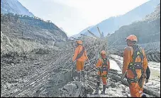  ?? PTI ?? NDRF personnel at a damaged hydel plant in Joshimath.