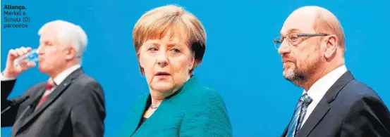  ?? HANNIBAL HANSCHKE/REUTERS ?? Aliança. Merkel e Schulz (D): parceiros