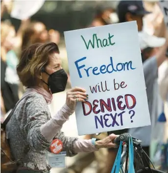  ?? CHRIS SWEDA/CHICAGO TRIBUNE ?? People march from Union Park to downtown Chicago on May 14 to protest the possible Supreme Court reversal of Roe v. Wade.