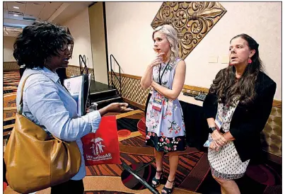  ?? Arkansas Democrat-Gazette/THOMAS METTHE ?? Allison Abromitis (center) and her mother, Bliss Deeter (right), visit with Cheryl Johnson after Abromitis spoke during an immunizati­on event Friday at the Wyndham Hotel in North Little Rock.
