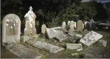  ??  ?? Vandalised graves at Old Kilbride Cemetery.