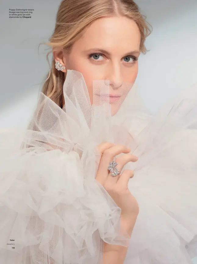  ??  ?? Poppy Delevingne wears Nuage earring and ring in white gold set with diamonds by Chopard