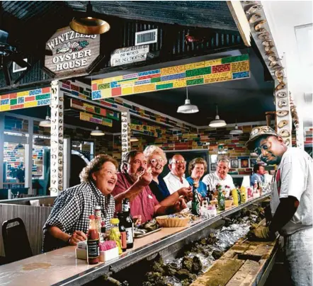  ?? Tad Denson / TNS ?? Willie Brown has shucked oysters at Wintzell’s in Mobile, Ala., for 40 years. Oyster lovers can get them “fried, stewed or nude.”