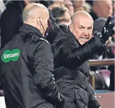  ??  ?? Rangers manager Mark Warburton protests over his side’s disallowed goal.