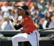  ?? CHRIS O’MEARA — THE ASSOCIATED PRESS ?? Baltimore’s Colby Rasmus hits a double off Tampa Bay starting pitcher Ryan Weber Friday in Sarasota, Fla.