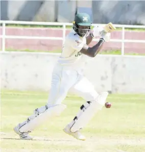  ?? (Photo: Joseph Wellington) ?? Jamaica Scorpions batsman Carlos Brown plays to the off side during the regional four-day match against Barbados Pride at Sabina Park on Friday.