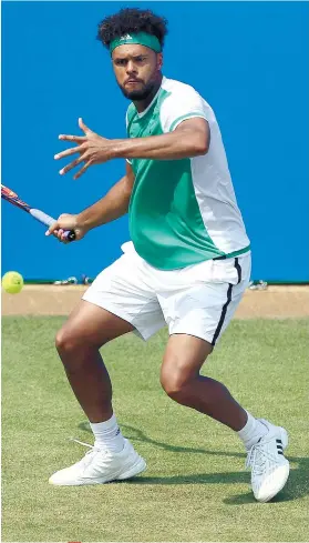  ?? AP FOTO ?? ANOTHER ONE BITES THE DUST. Jo Wilfred Tsonga joins other top seeded players, who exited early in the Queen’s tournament after losing to Gilles Muller.