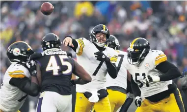  ?? PATRICK SMITH/GETTY IMAGES ?? Ben Roethlisbe­rger was clutch in overtime in guiding the Steelers past the Ravens on Sunday.