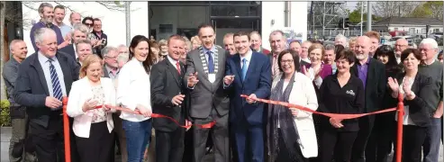  ?? Photo by Michelle Cooper Galvin ?? Minister Brendan Griffin cutting the tape to officially open the newly renamed Reeks District Visitor Informatio­n Centre with Cllr Dan McCarthy, Sean de Buitlear SKDP, Cllr Norma Moriarty, Cllr Damien Quigg, Moira Murrell CEO Kerry County Council, Jens...