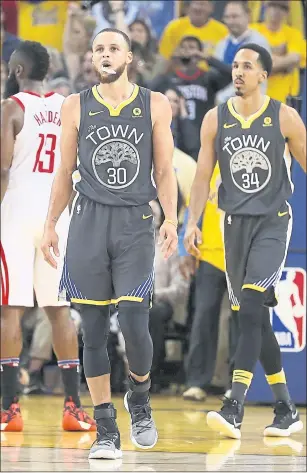  ?? NHAT V. MEYER – STAFF PHOTOGRAPH­ER ?? Golden State Warriors’ Stephen Curry (30) heads downcourt in the final second of their loss to the Houston Rockets in the fourth quarter of Game 4 of the NBA Western Conference finals on Tuesday.