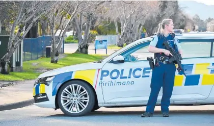  ?? Photo / Matt Brown/Top South Media ?? Police at Marlboroug­h Girls’ College yesterday after it was again the target of threats.