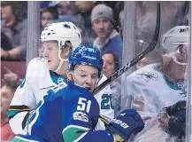  ??  ?? Troy Stecher (51) plays every shift like it just might be his last. Fans will never leave the rink thinking the Canucks defenceman didn’t deliver his best effort out there.