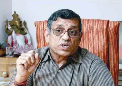  ?? — AFP ?? Swaminatha­n Gurumurthy speaks in an interview during a press conference in New Delhi, in this file photo.