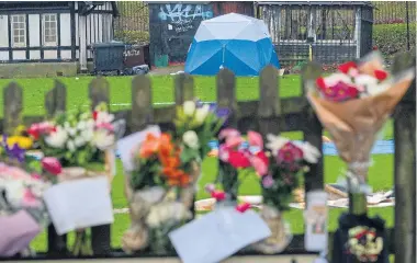  ??  ?? Floral tributes at the crime scene yesterday after the barmaid’s body was found in Finsbury Park