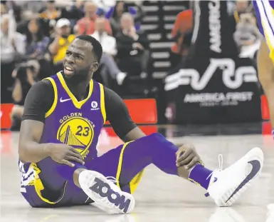  ?? Gene Sweeney Jr. / Getty Images ?? Draymond Green looks for a foul call at Utah in Golden State’s final regular-season game. The struggling Warriors await Wednesday night’s results to learn their opponent in the first round of the playoffs.