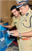  ??  ?? Commission­er Mahesh Bhagwat inspecting the drugs seized from the Nigerians. —