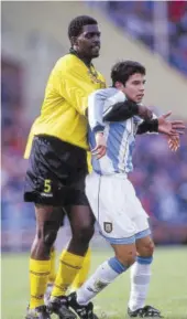  ?? (Photo: Juha Tamminen) ?? Jamaica’s Shane Stevens (left) keeps a close watch on Argentina’s Javier Saviola in the 2001 Fifa Under-20 World Cup in Argentina.