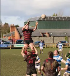  ??  ?? Arklow’s Joe Bulmer climbs to catch this lineout during the game against Athy.