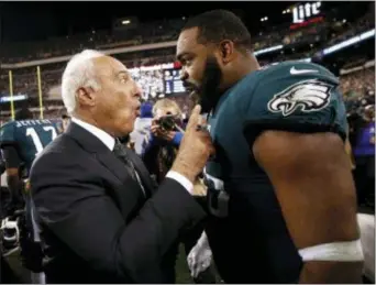  ?? THE ASSOCIATED PRESS FILE ?? Eagles defensive end Brandon Graham, right, wants to see owner Jeff Lurie happy again. A win over the Jacksonvil­le Jaguars Sunday would be a nice start in that effort, and would also be a nice way to start Graham’s British vacation with his wife.