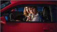  ?? WILSON WEBB, SONY PICTURES ENTERTAINM­ENT ?? Baby (Ansel Elgort) and Debora (Lily James) jack a car to get away in “Baby Driver.”