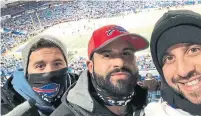  ??  ?? Buffalo Bills season ticket holder Jason Tangorra, right, with cousins Jordan Conti and Alexander Conti.